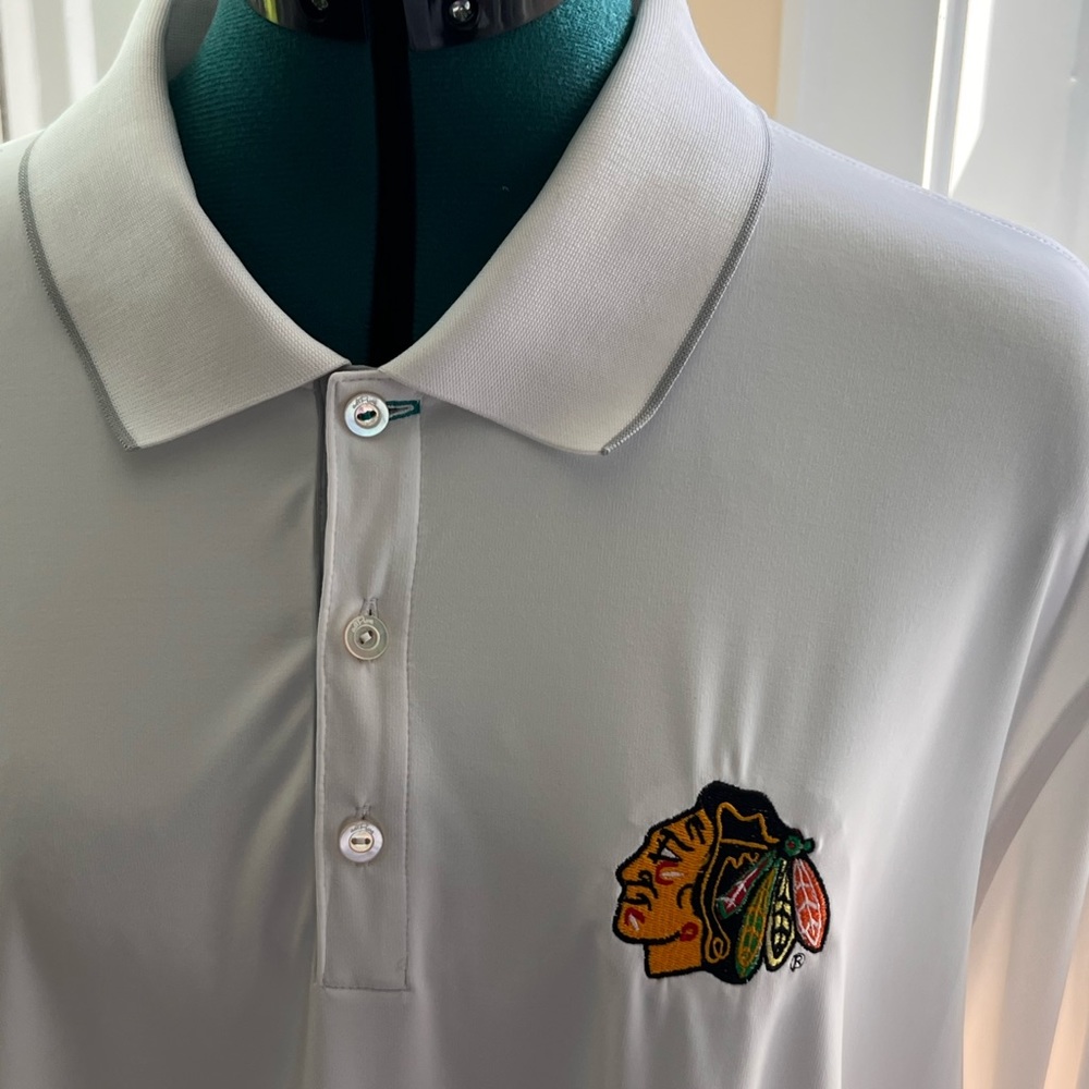 adi Pure by Adidas mens white golf shirt with Chicago Blackhawks patch on front